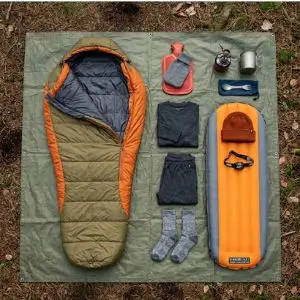 Gear + sleep system flat lay